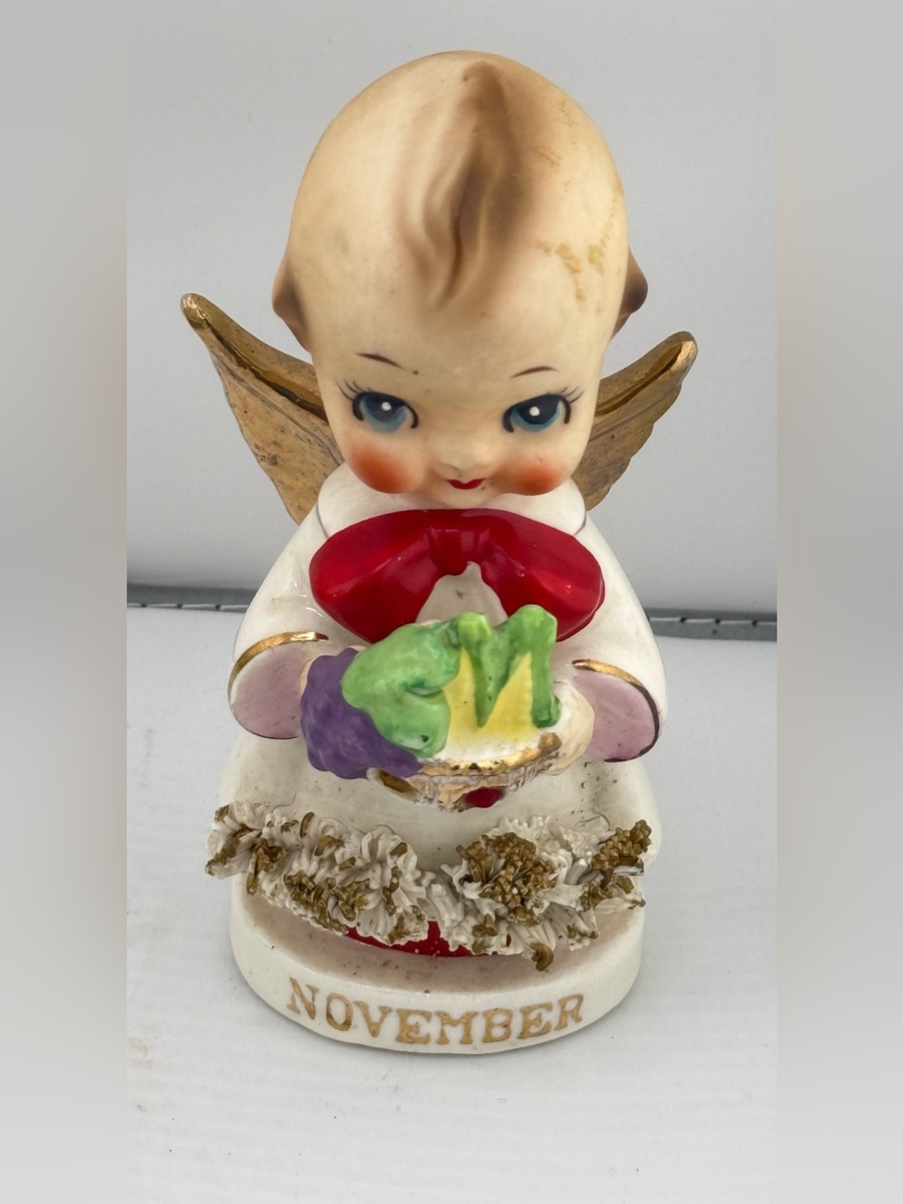 Vintage November Angel Figurine with Gold Wings